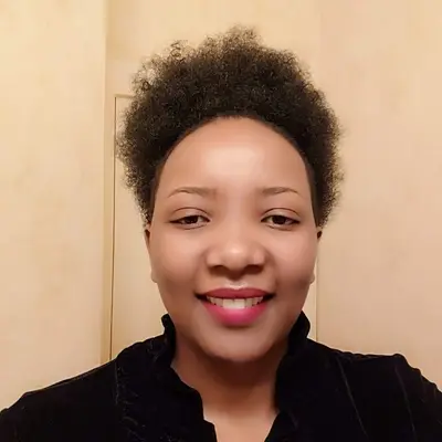 Elizabeth Kirugumi - TMS psychiatrist in N Main St. Creedmoor